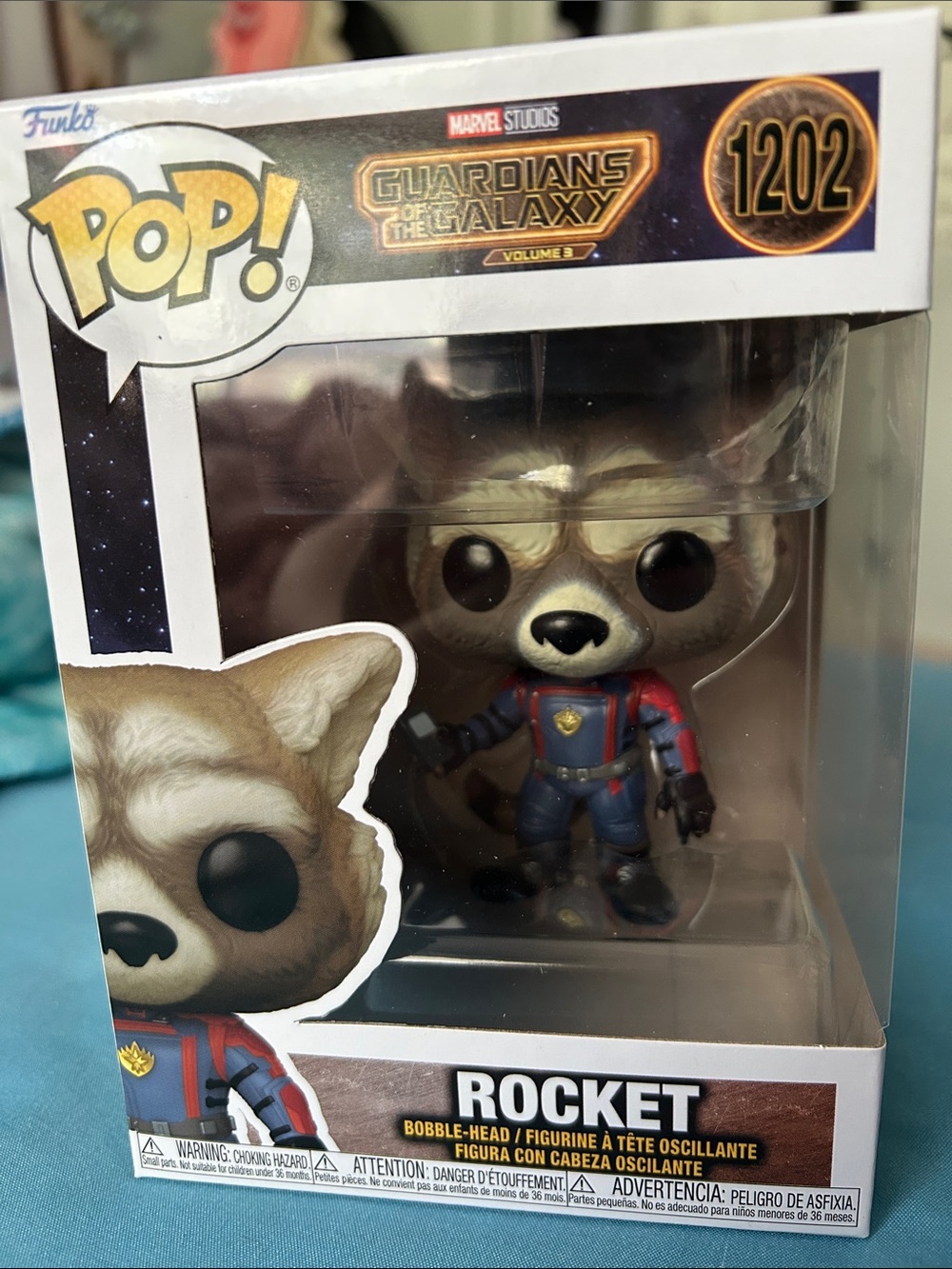 Funko Rocket Vinyl Figure in Blue and Red Suit